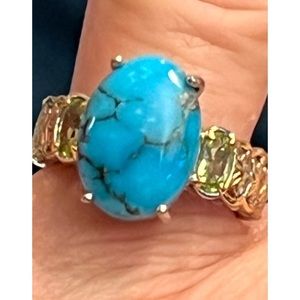 Kingman 10mm x 14mm Turquoise ring with peridot accent stones